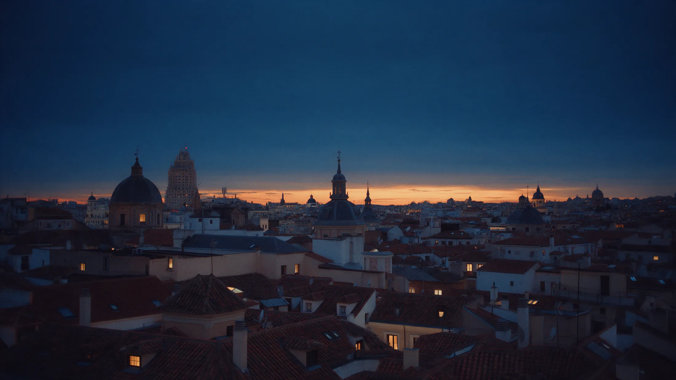 Madrid rooftops and domes at blue hour
